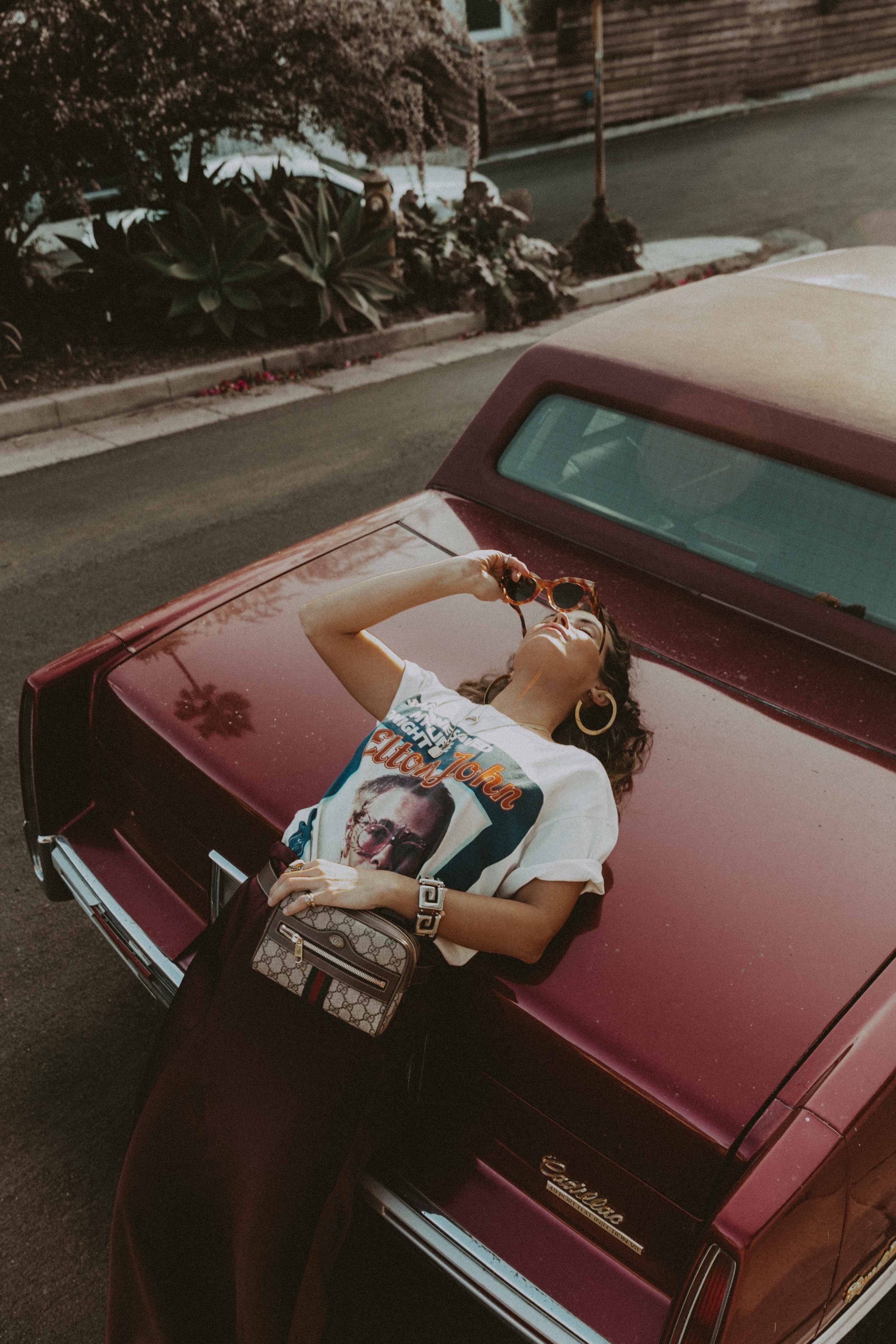 Sara of Collage Vintage wearing Joseph skirt and vintage Gucci tee